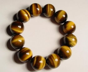 屬虎火命人戴虎眼石好嗎,屬虎火命人佩帶什麼玉最好