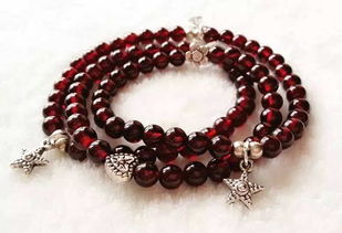 屬龍火命戴石榴石好嗎,石榴石和海藍寶能一起戴嗎?有人幫我算了一下,說我五行缺火,石榴